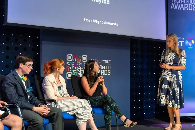 A panel discussion on stage at the Tech4Good Awards